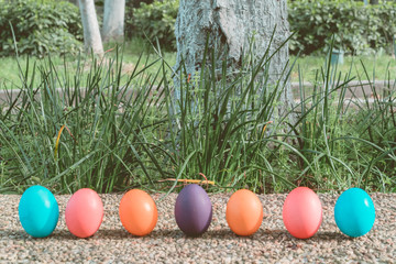 Easter sunday, happy easter, colorful easter eggs hunt holiday decorations easter concept backgrounds with copy space
