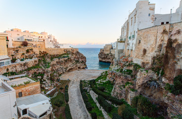 Obraz premium Morning view of Polignano A Mare town. Famous Italian rocky beach. South of Italy.