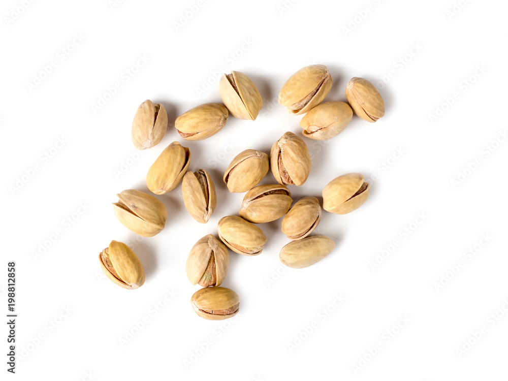 Wall mural pistachios isolated white background