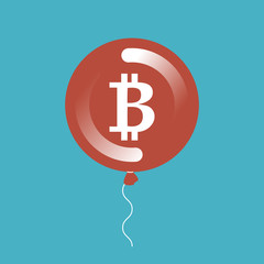 concept of investing in bitcoin - balloon and coin bitcoin inside