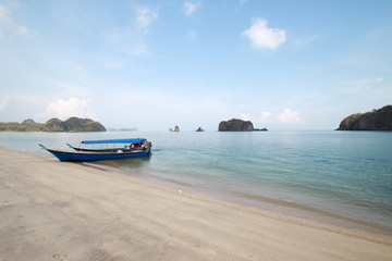 Fototapeta na wymiar Fishing boats at the shore of Langkawi island, Malaysia