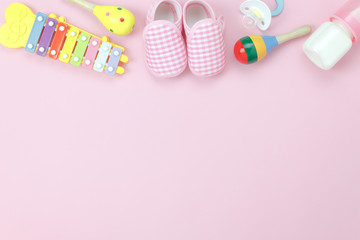 Table top view decoration kid toys for develop background concept.Flat lay baby shoes with items...