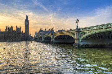Fototapeta na wymiar London attractions Big Ben and Westminster Bridge landscape during a Winter sunset