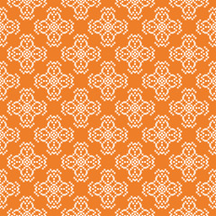 Fototapeta premium White floral seamless pattern on orange background