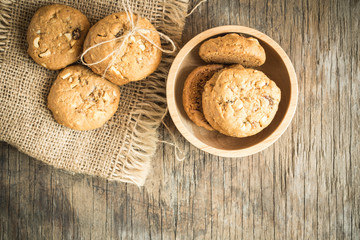 Top view and overhead shot of cookies on old wooden background,Homemade cookies on sackcloth