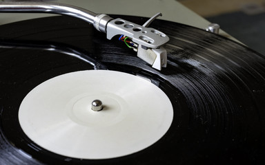 Old music records on turntable. Hifi audio system
