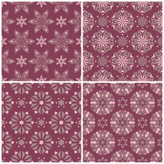 Set of violet seamless backgrounds with floral patterns