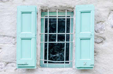 An open window of a mountain shelter