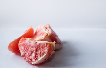 grapefruit slices on a white background