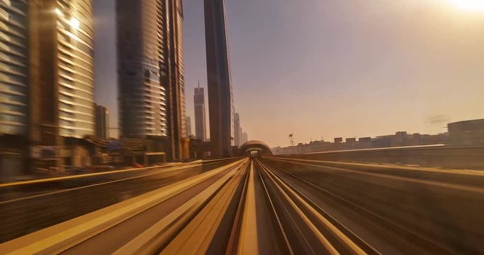 Dubai elevated Rail Metro System, running alongside the Sheikh Zayed Rd Time Lapse. High Speed Metro Train in Dubai.
