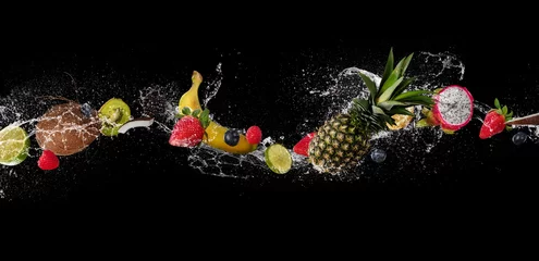 Fotobehang Pieces of fruit in water splash, isolated on black background © Jag_cz
