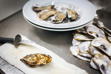 closed sea mussel lays on a towel