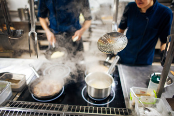 cooking on the stove in the restaurant