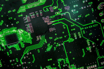 A green PCB with backlight and some passive components