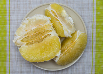 Purified pomelo lying in a plate