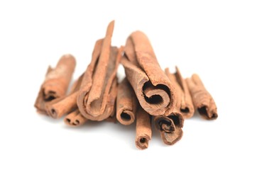 Cinnamon sticks putting on white background
