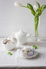 Homemade marshmallows on a light background. Russian stavberry, vanila and lavender zephyr. Selective focus. Marshmallov