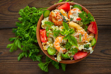  delicious gigli t with shrimps and basil on  plate
