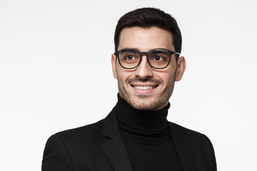 Fototapeta premium Close up portrait of fashion buyer or male stylist isolated on grey background