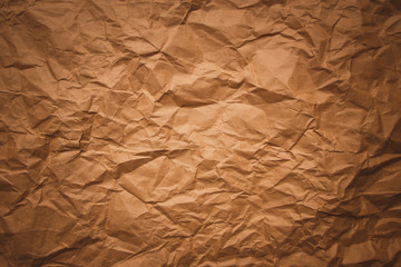 Brown rough crumpled recycled paper texture
