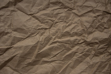 Crumpled paper background vignette