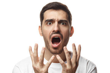 Why?! Young man asking somebody about wrong decision, gesturing with both hands