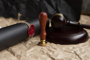 Old notarial wax seal on tied scroll, closeup