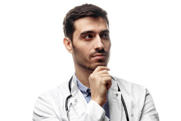 Picture of young man doctor thinking about treatment isolated on white background