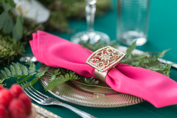 table setting. Wedding decor in the magic forest for a loving couple. Pink and green colors. Raspberry dessert.