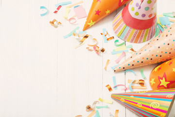 birthday decoration on white wooden background