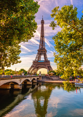 Paris Eiffel Tower and river Seine in Paris, France. Eiffel Tower is one of the most iconic landmarks of Paris - obrazy, fototapety, plakaty