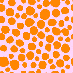 Seamless pattern with gold round spots scattered on pink background, vector illustration.
