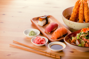 Japanese food combination, sushi nigiri, gyoza, crab salad and fried king prawns