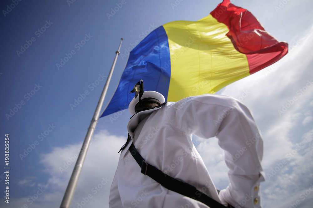 Wall mural A Romanian military sailor takes part at the ceremonies during the Romanian Navy Day