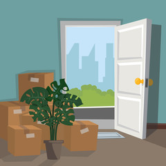 Boxes and a house plant, folded near the front door for moving (delivery).