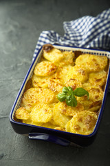 Homemade potato gratin with cream and cheese