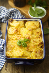 Homemade potato gratin with cream and cheese