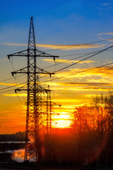 Image of high voltage power line and sky.