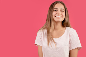 Fototapeta premium young woman with charming smile. white teeth.
