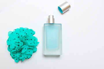 Women's accessories, turquoise color, hairpin, perfume. Premium perfume for women.