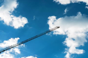 silhouette crane construction site on sky background