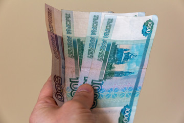 Russian money in a hand