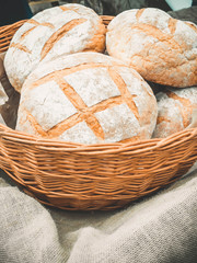 Fresh hearth round bread in basket