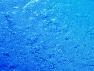 Dark blue paint textured water