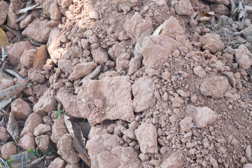 Pile of cracked soil on construction site
