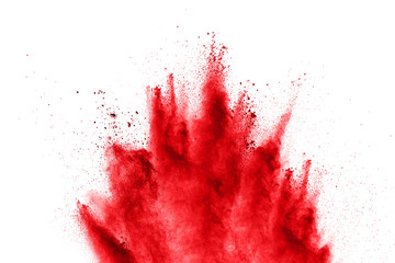 abstract red powder explosion on  white background. abstract red dust splattered on background. Freeze motion of red powder splashing.