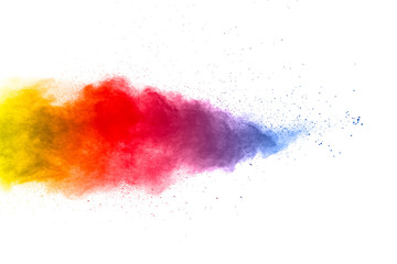 Abstract multi color powder explosion on white background.  Freeze motion of color dust  particles splashing. Painted Holi in festival