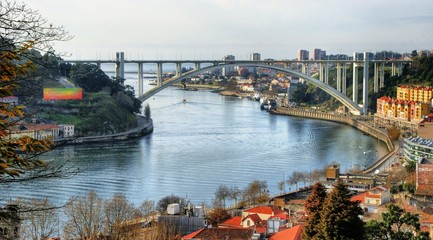 Panoramic view over Arrabida bridge in Oporto, Portugal