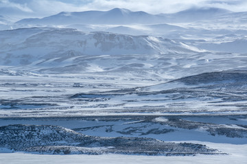 Snow-covered mountains. Central highlands, Iceland.