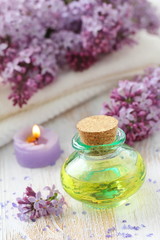 Plakat SPA setting. Essential aroma oil with lilac